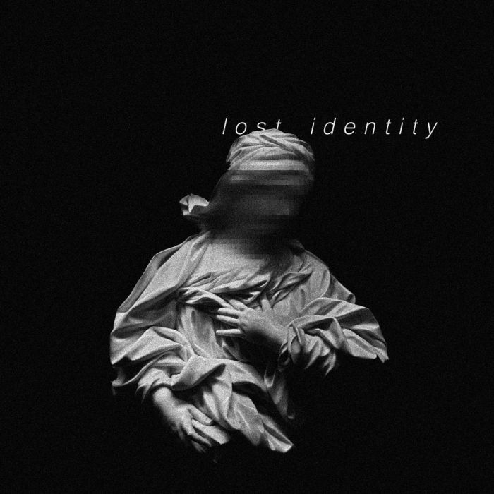 Black and white image of statue whose face is pixelated and lost identity is written behind it
